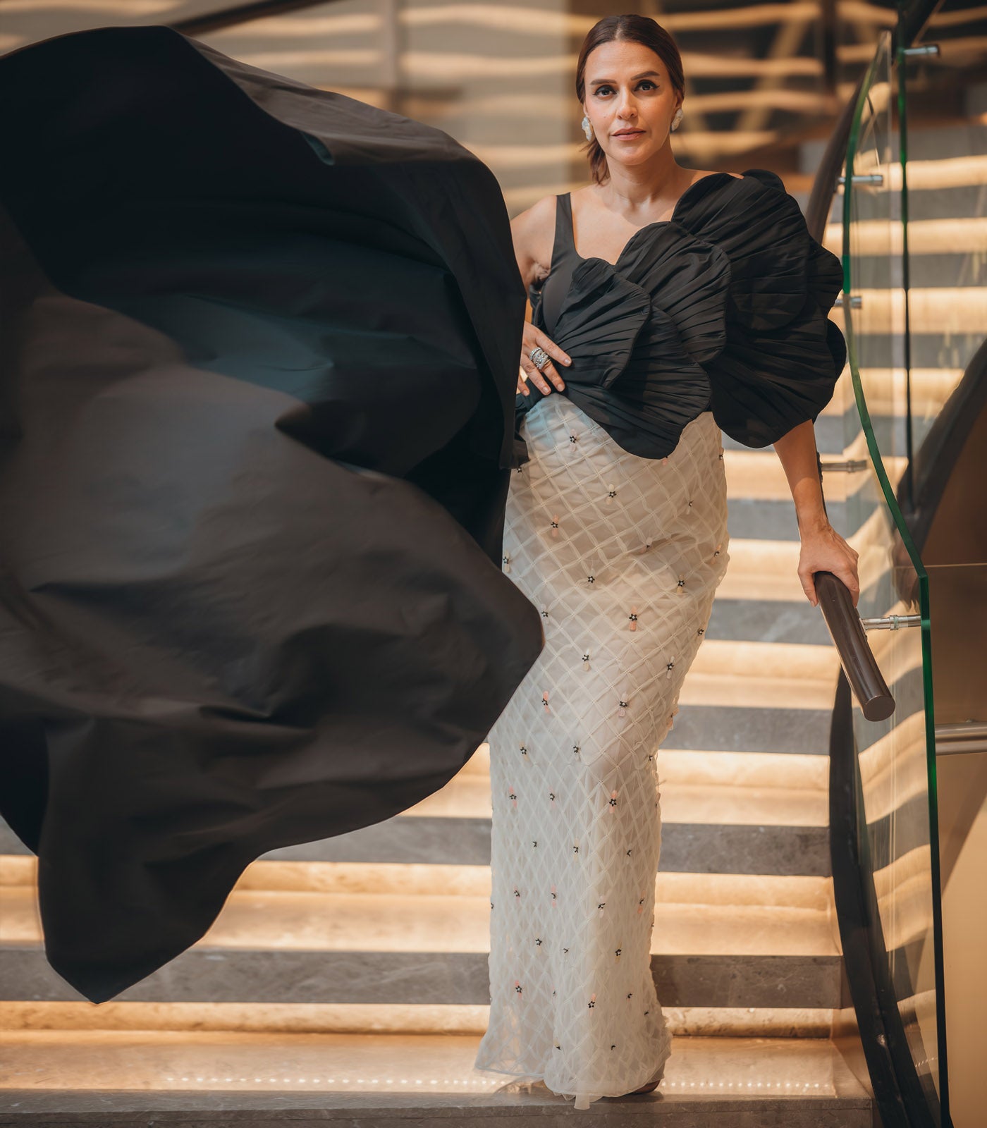 Neha Dhupia spotted in our black and white textured gown