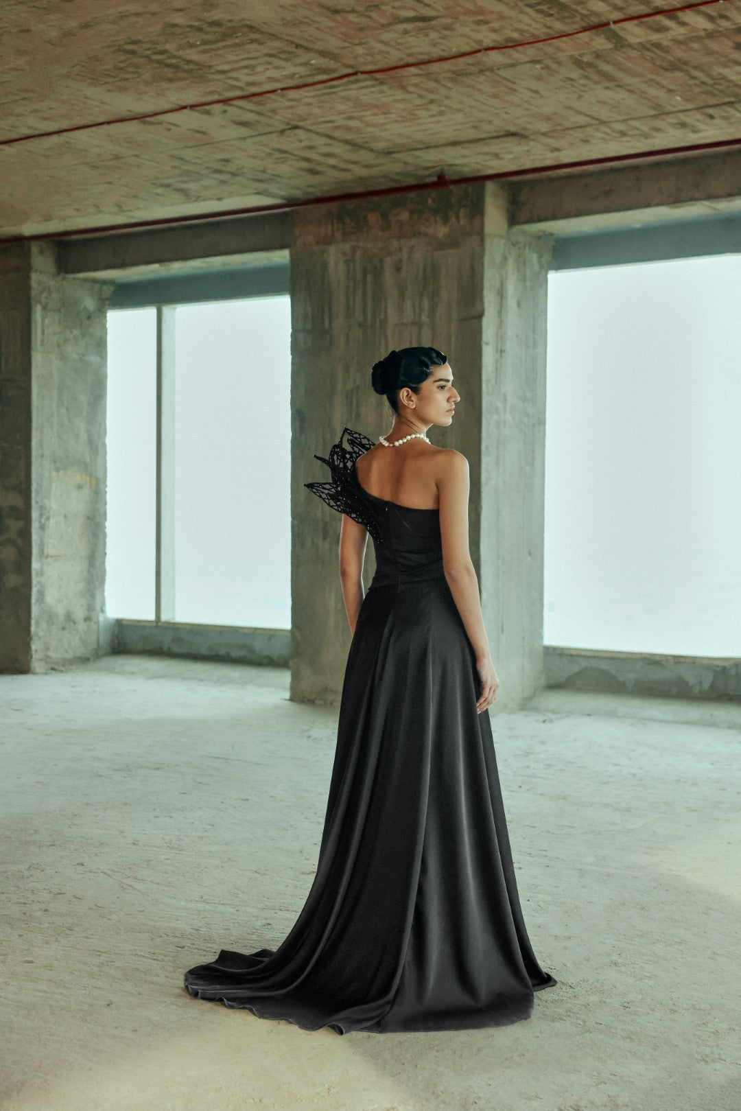 Embellished asymmetrical gown