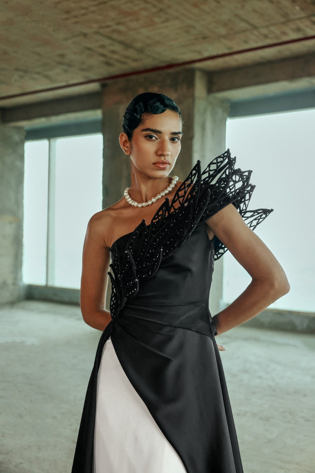 Embellished asymmetrical gown