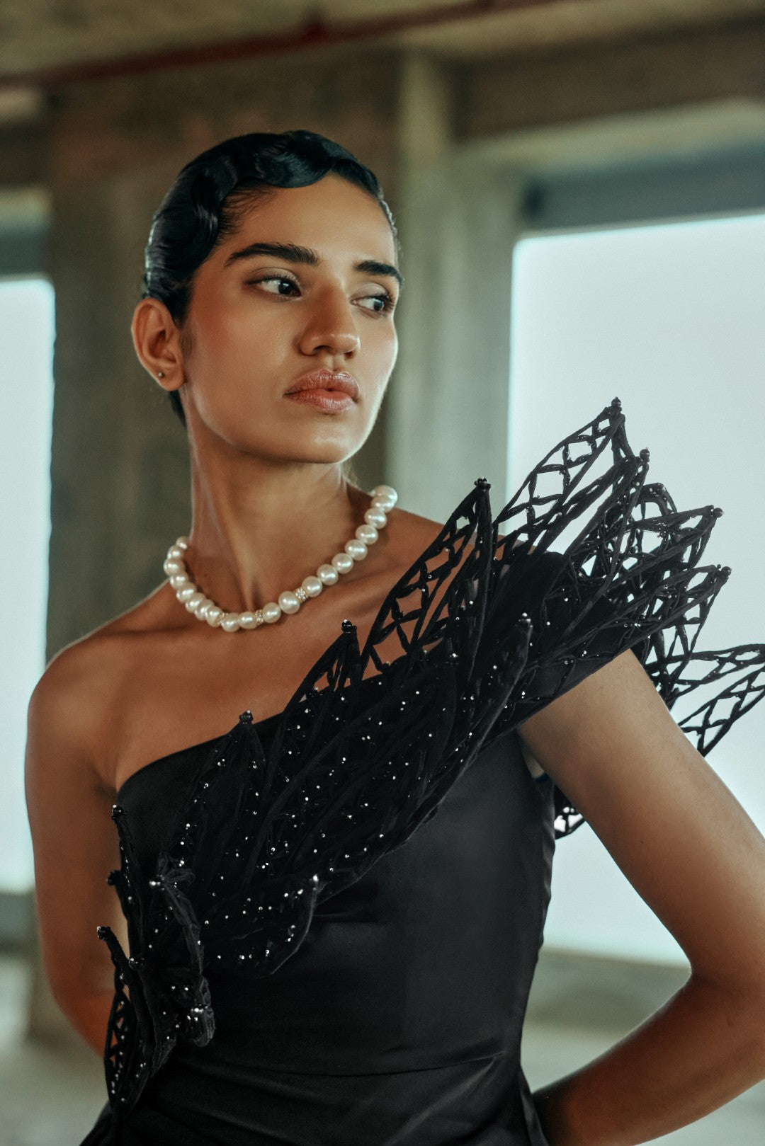 Embellished asymmetrical gown